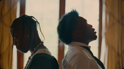 a couple of men standing next to each other