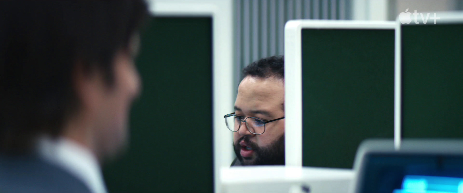 a man looking at his reflection in a mirror