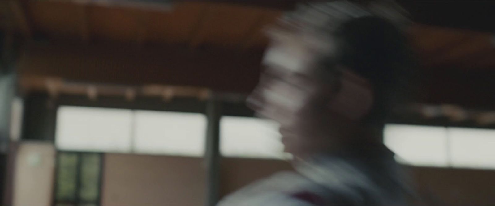 a blurry photo of a man in a baseball uniform