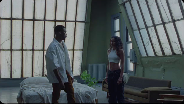 a man and a woman standing in a room