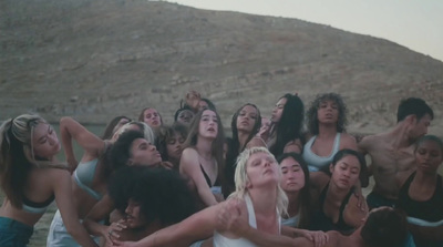 a group of women standing next to each other