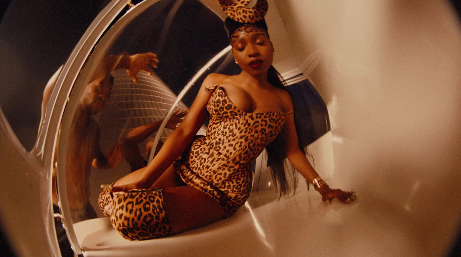 a woman in a leopard print bathing suit