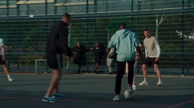 a group of young men playing a game of soccer