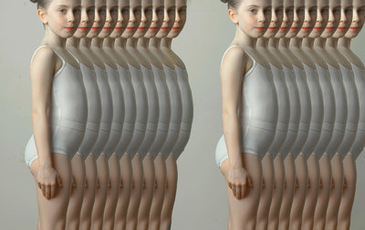 a woman is standing in front of a series of identical images