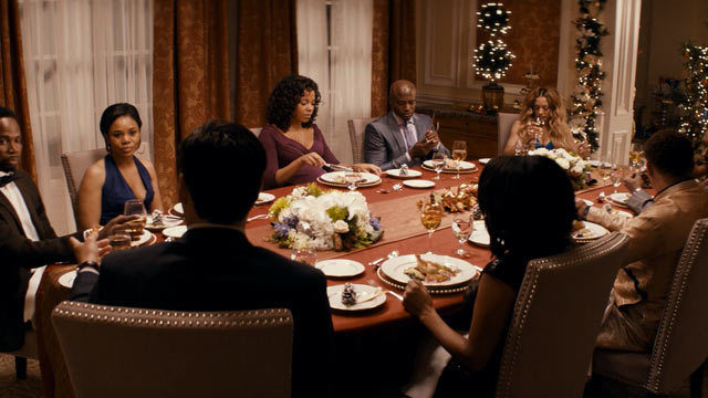 a group of people sitting around a dinner table