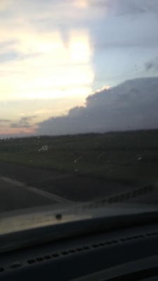 a view of a road from inside a car