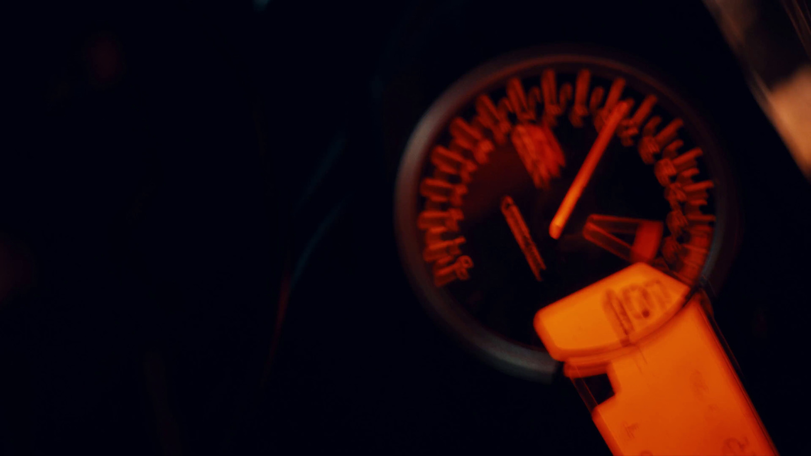 a close up of a speedometer in a car