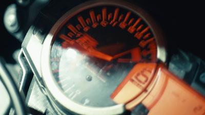 a close up of a speedometer on a motorcycle