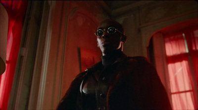 a man in a leather outfit and goggles