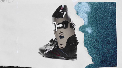 a pair of ski boots sitting on top of a piece of paper