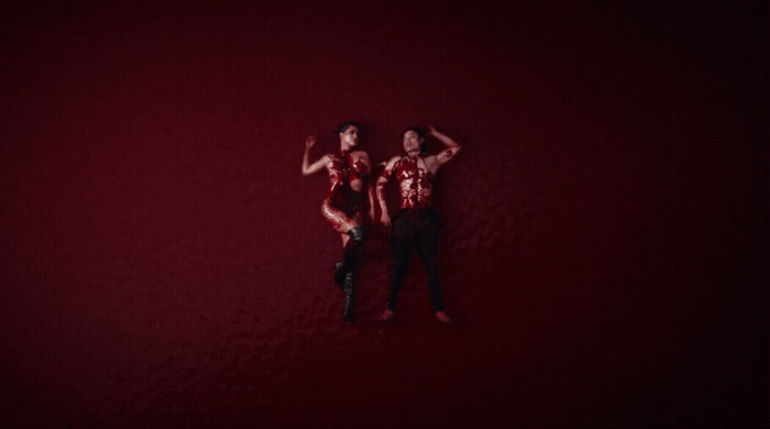 a couple of people standing next to each other