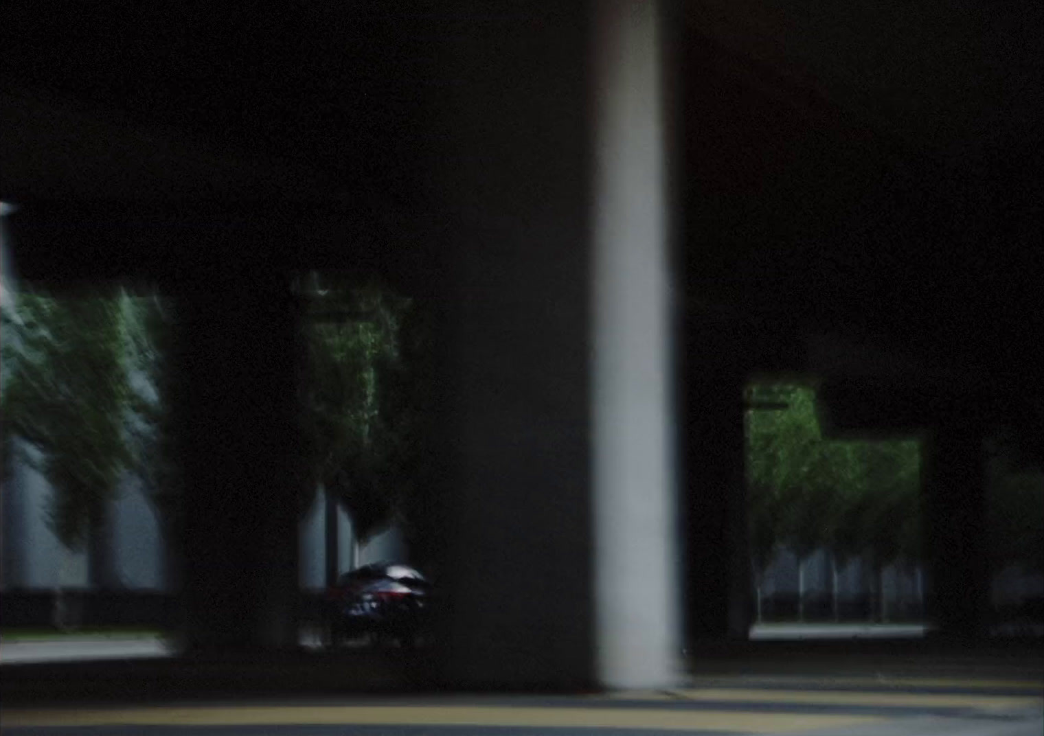 a blurry photo of a person holding an umbrella