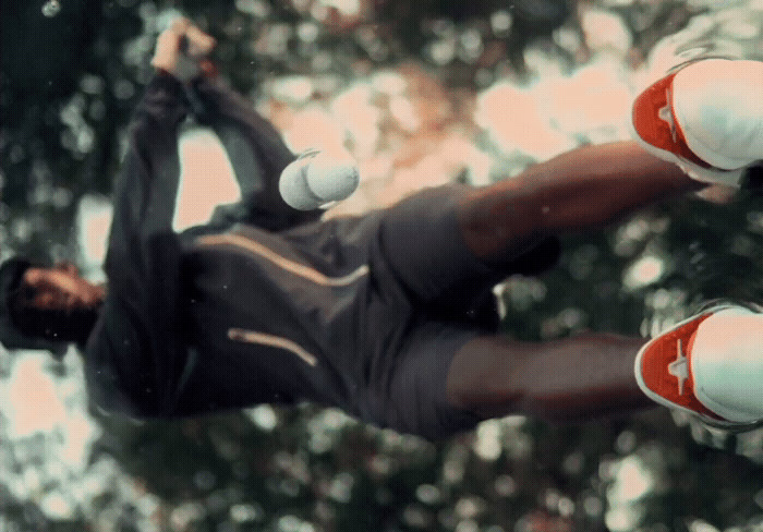 a skateboarder is doing a trick in the air