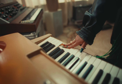 a close up of a person's hand on a keyboard