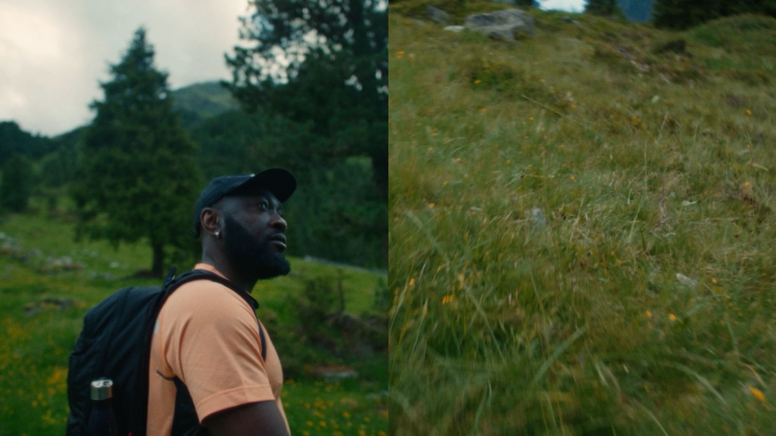 a man with a backpack standing in a field