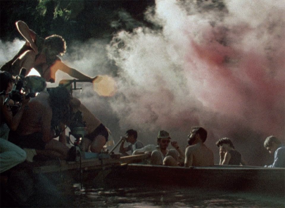 a group of people on a boat in a body of water