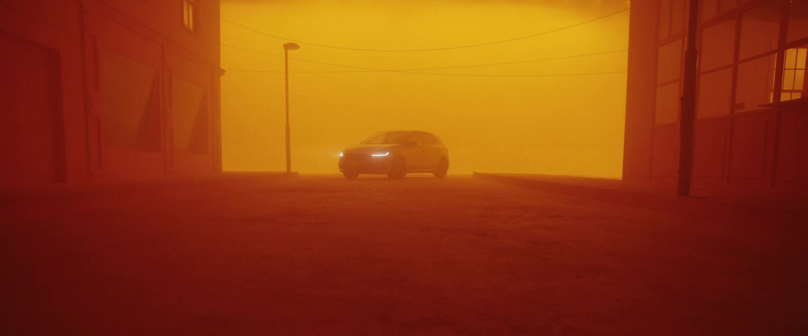 a car driving through a foggy parking garage