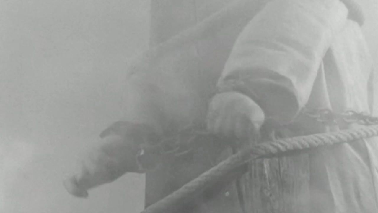 a black and white photo of a statue of liberty