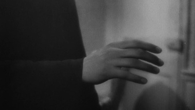 a black and white photo of a person's hands