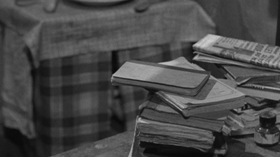 a pile of books sitting on top of a table