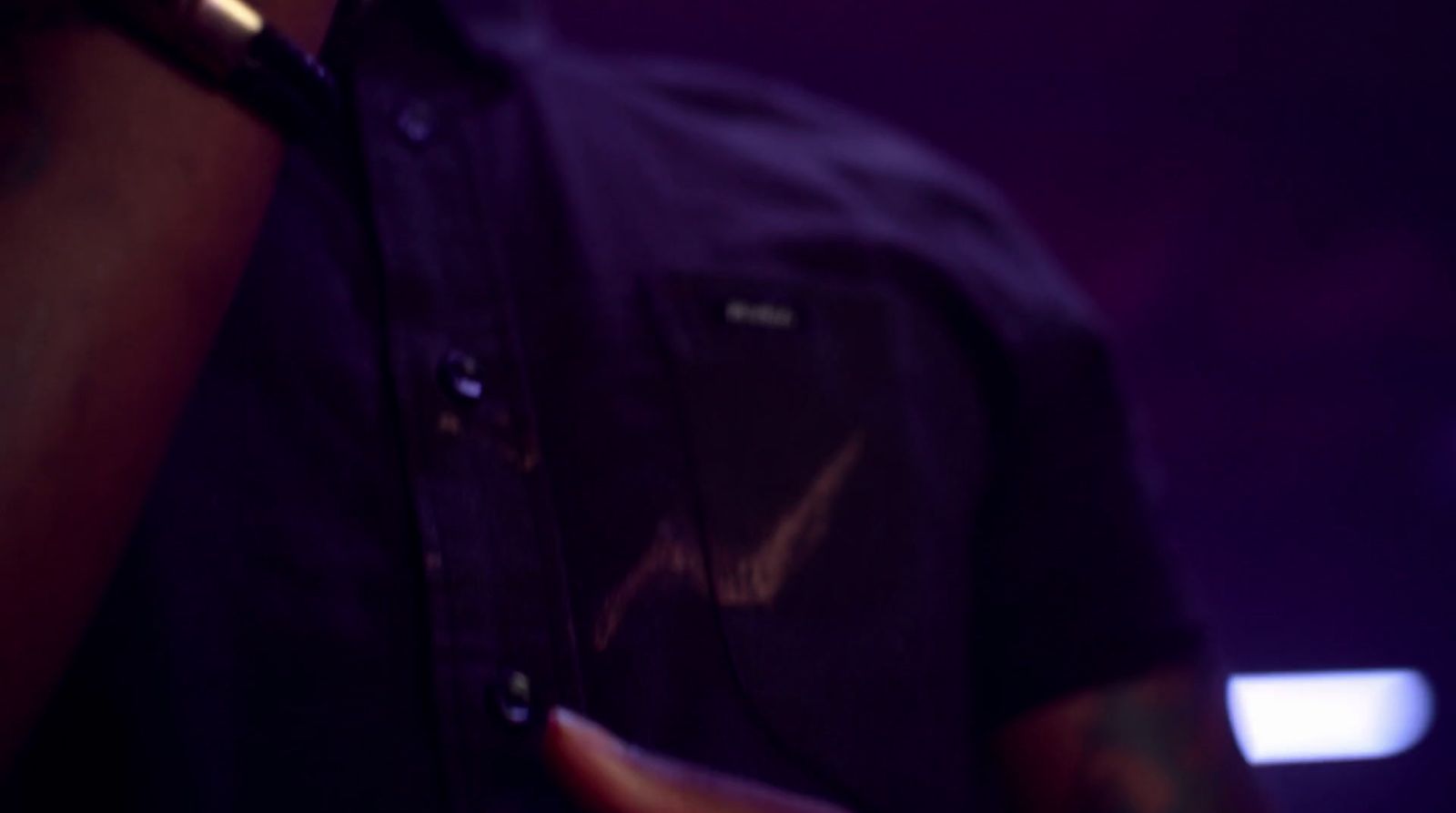 a close up of a person holding a cell phone