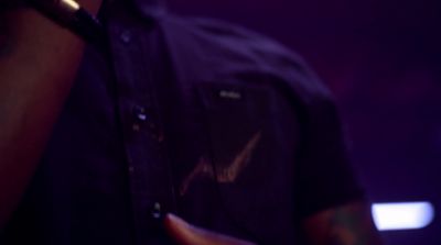 a close up of a person holding a cell phone