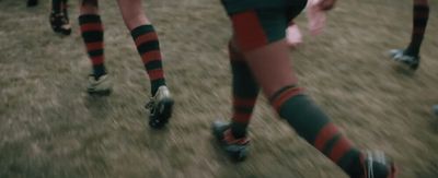 a group of people in striped socks and socks