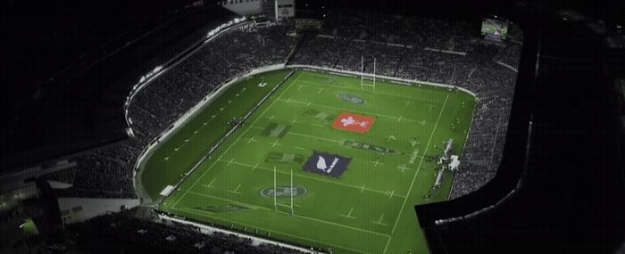 an aerial view of a soccer field at night