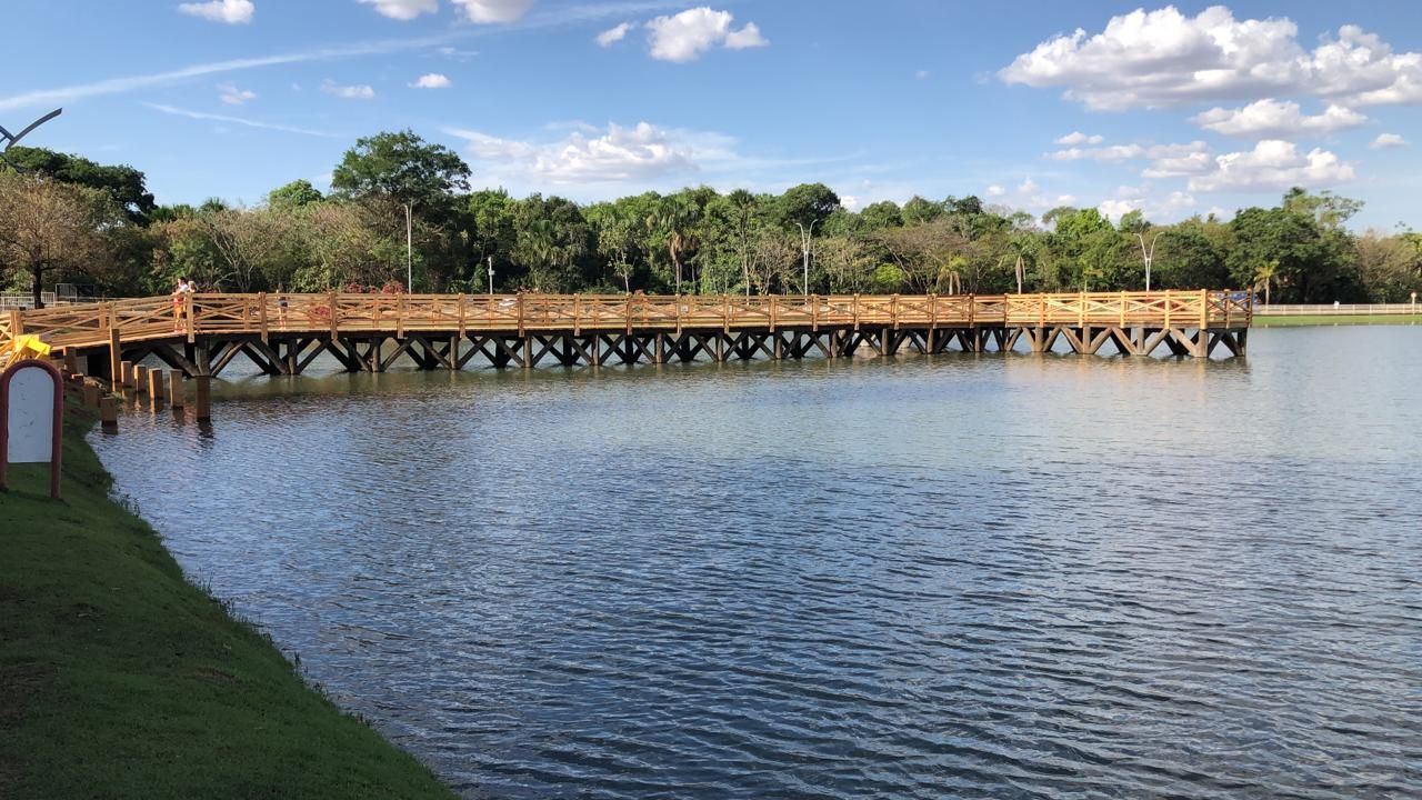 a wooden bridge over a body of water