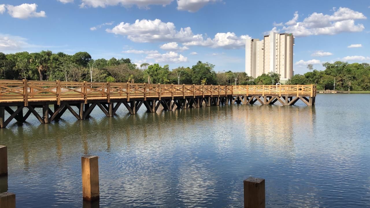 a wooden bridge over a large body of water