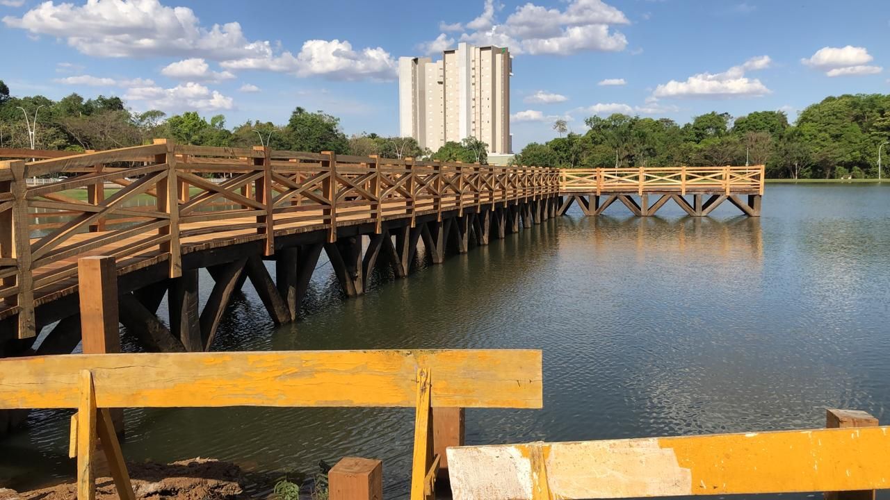 a wooden bridge over a body of water