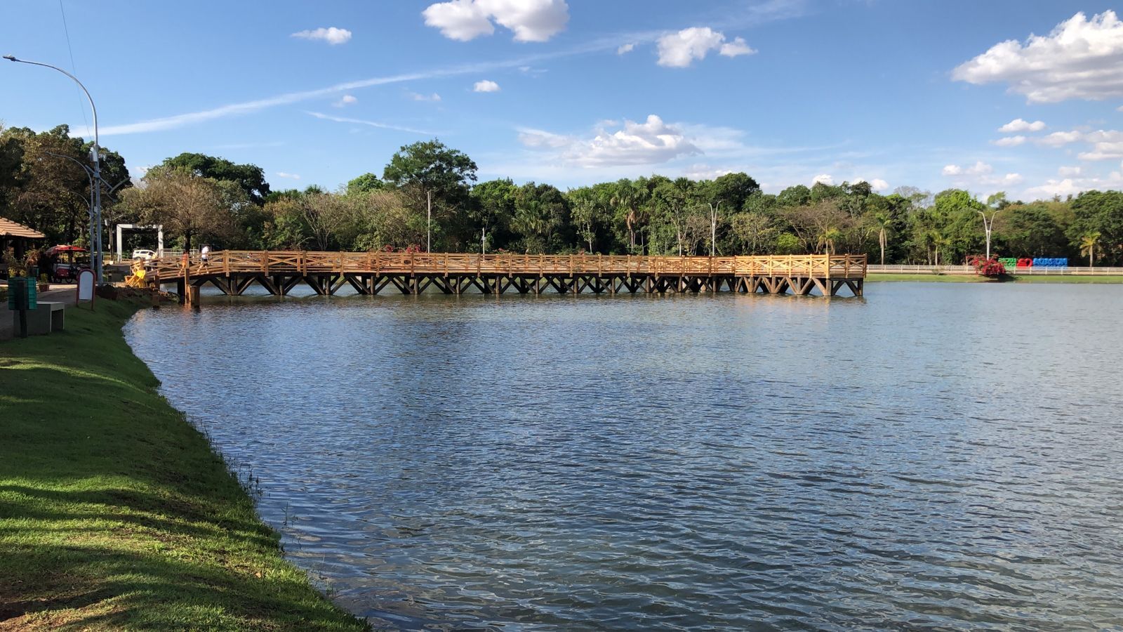 a wooden bridge over a large body of water