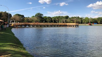 a wooden bridge over a large body of water