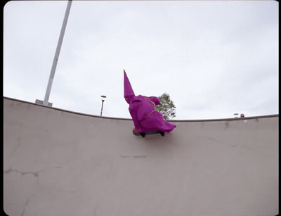 a person riding a skateboard on a ramp