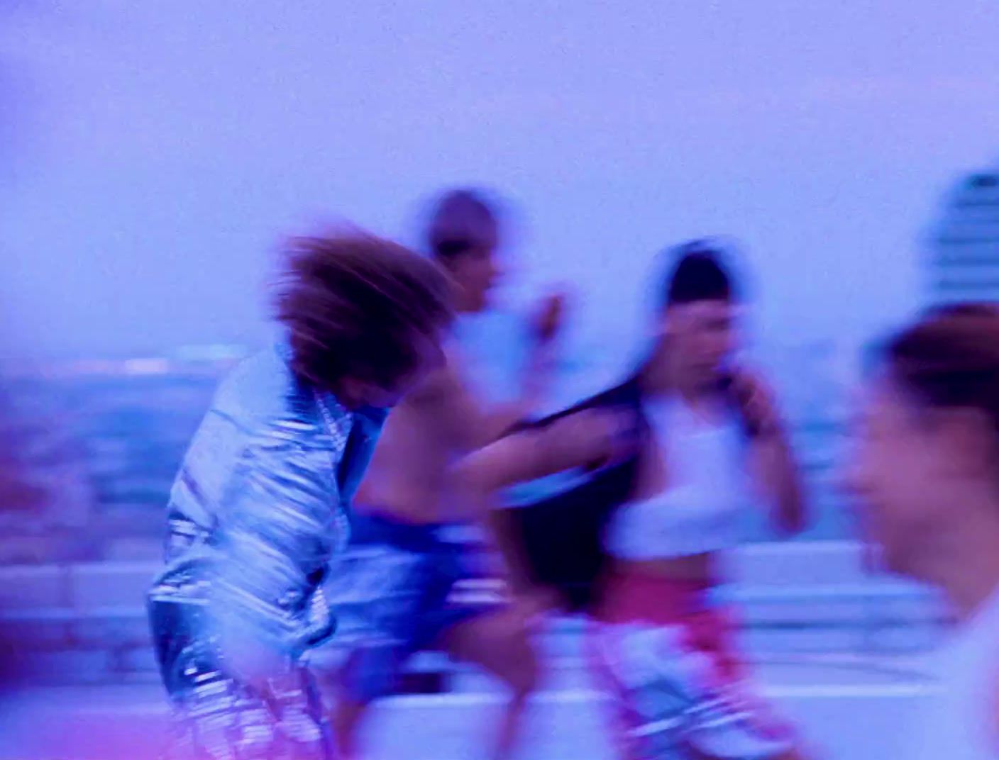 a blurry photo of a group of people on a bridge