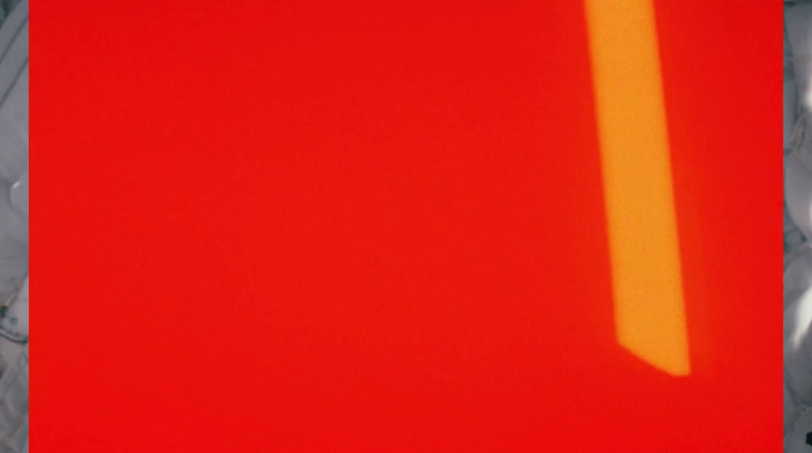 a close up of a red piece of paper