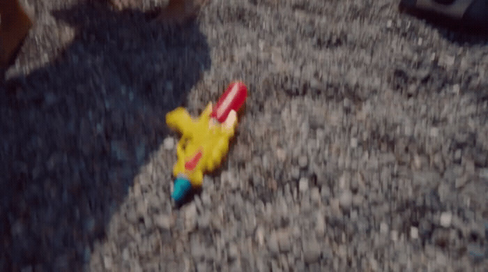 a toy airplane is sitting on the ground