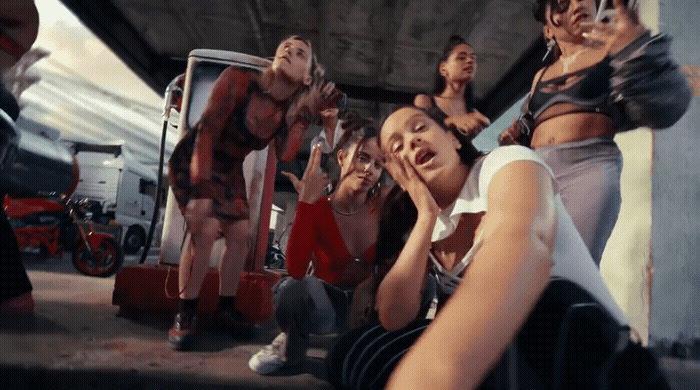 a group of young women standing next to each other