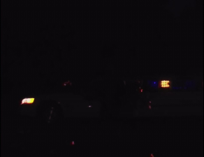 a blurry photo of a car at night