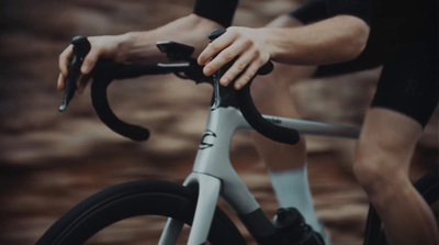 a close up of a person riding a bike