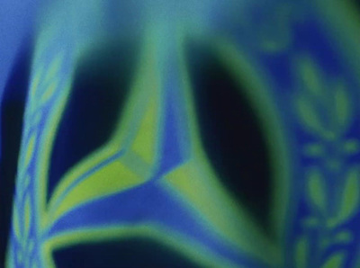 a close up of a blue and green background