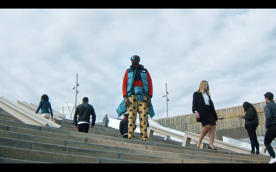 a group of people walking up a flight of stairs