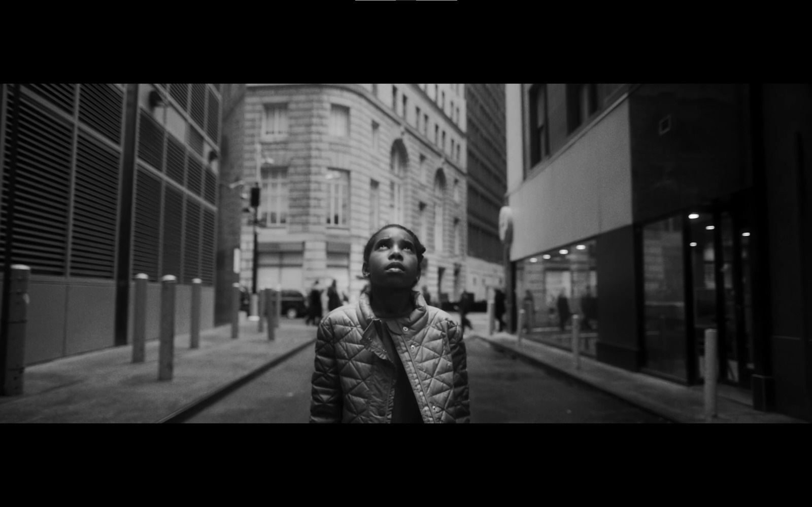 a man standing in the middle of a street