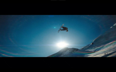 a man flying through the air while riding skis