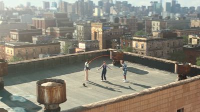 a group of people standing on top of a roof