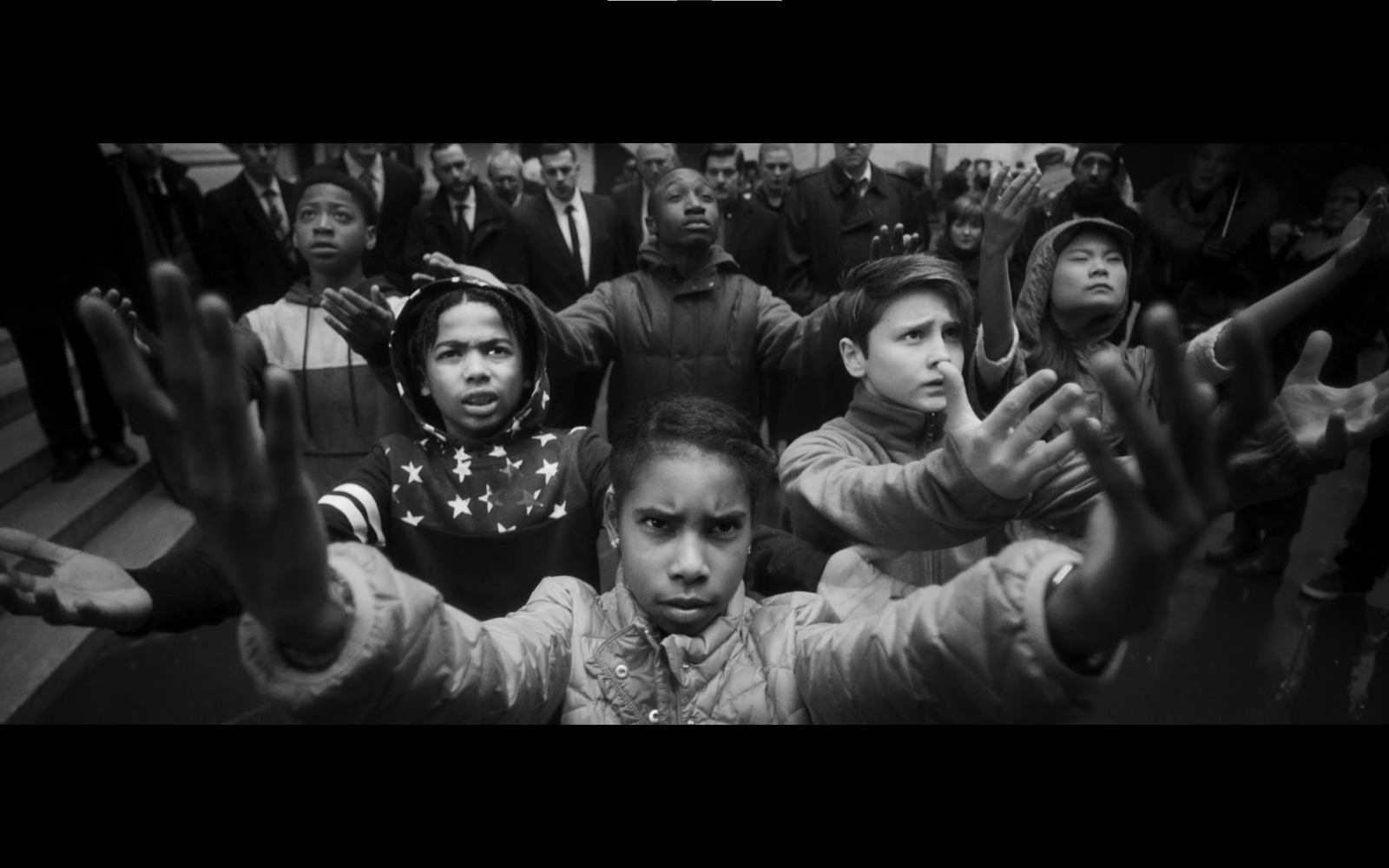 a black and white photo of a group of people