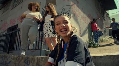 a group of young women standing next to each other