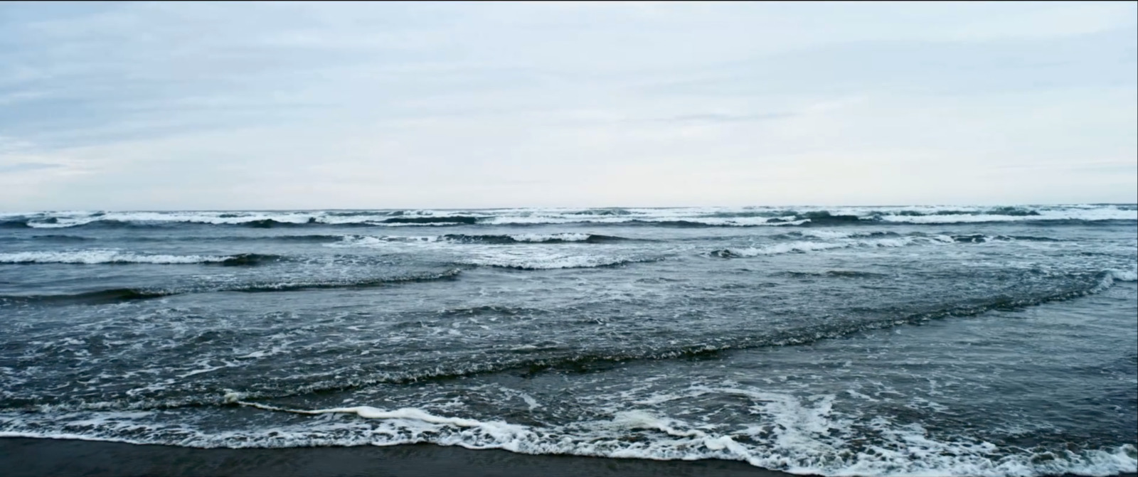 a view of the ocean from a beach