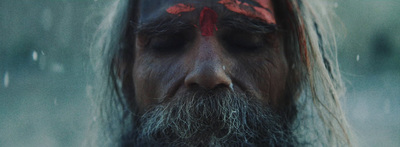 a man with long hair and a beard