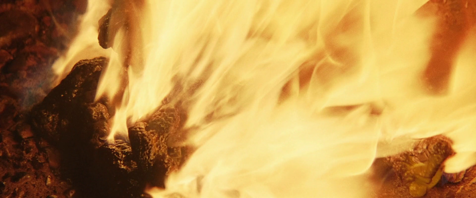 a close up of a fire hydrant with water coming out of it